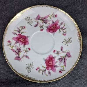 Vintage unmarked floral saucer with gold edge
